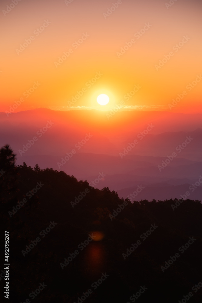 Sunrise over mountain with colorful sky in tropical rainforest at national park in the morning