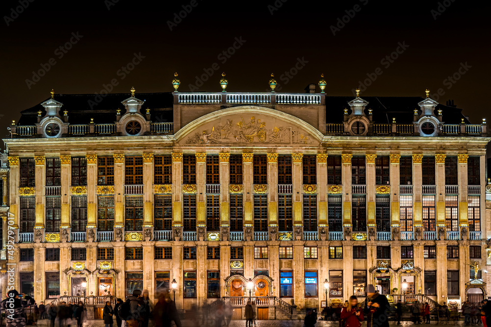 Front view of the historic House of the Dukes of Brabant at night in Grand Place, the central square of Brussels capital city, surrounded by opulent guildhalls