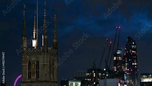 Evening View of Southwark Cathedral and London Eye, London, United Kingdom photo