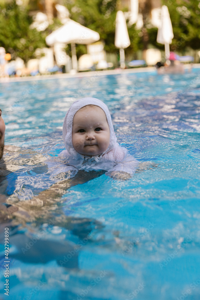 baby in pool, child playing in the pool , child in pool baby in pool, child playing in the pool , child in pool