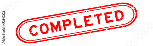 Grunge red completed word rubber seal stamp on white background