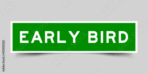 Sticker label with word early bird in green color on gray background