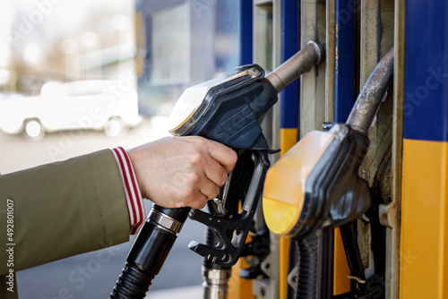 Hand fulfill fuel gasoline dispenser in station