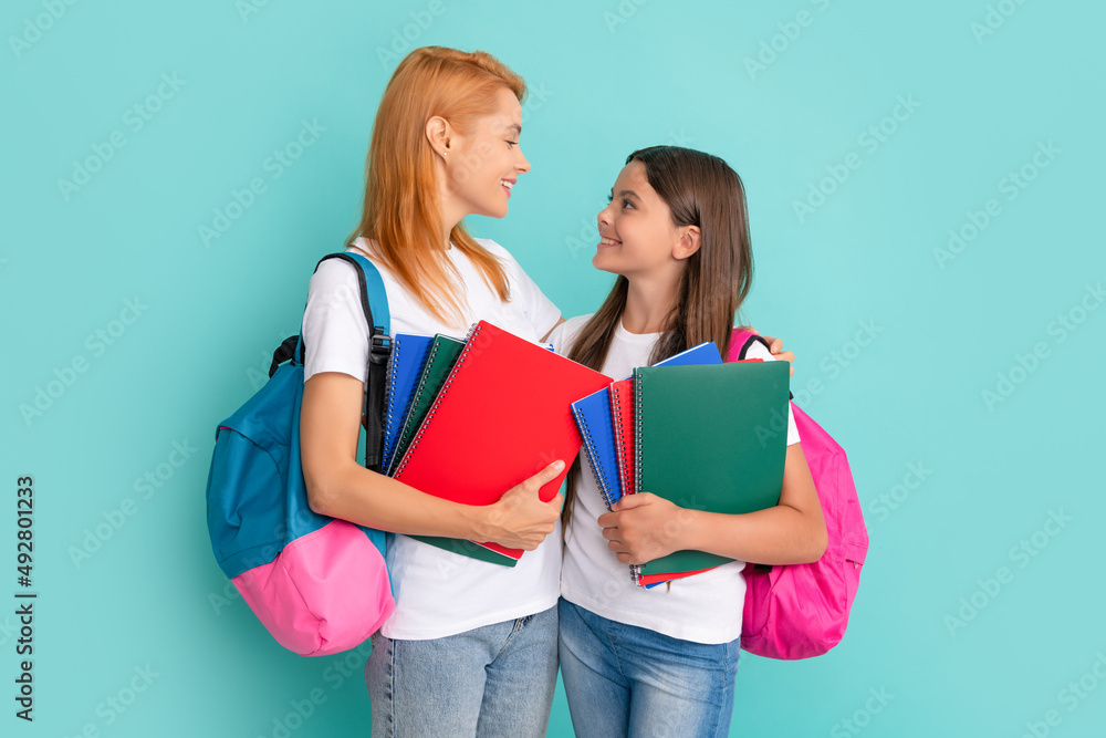 smiling school pupil and student holding textbooks and backpack, study smiling school pupil and student holding textbooks and backpack, study