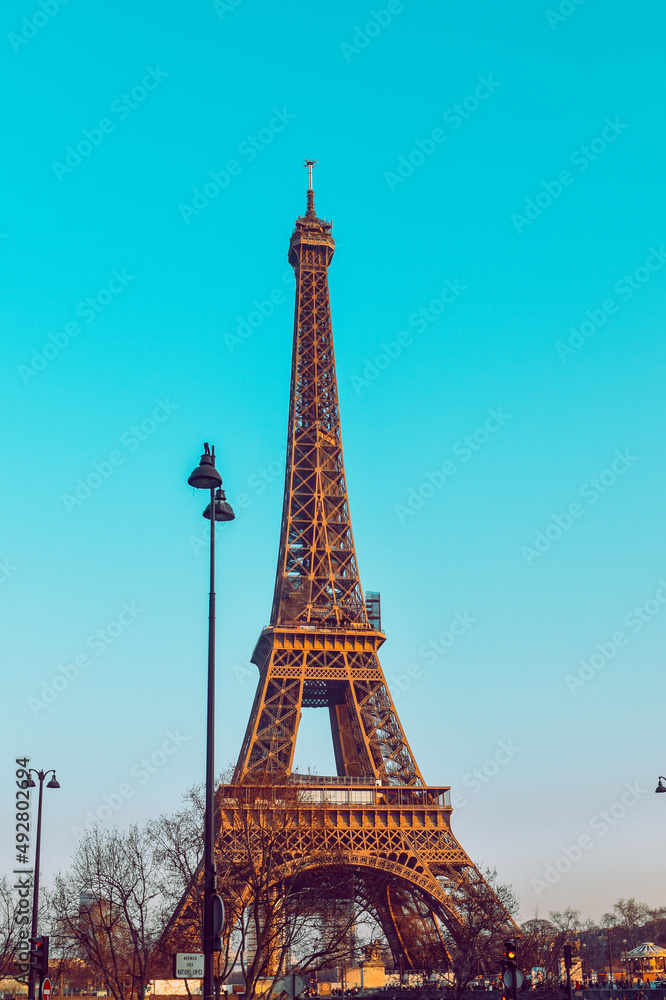 . The Eiffel Tower against a perfectly blue sky. Beauty travel in Paris, touristic place.