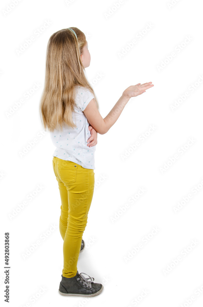 Back view of young girl confusing. Shocked little girl with hands up. Isolated on white background Back view of young girl confusing. Shocked little girl with hands up. Isolated on white background