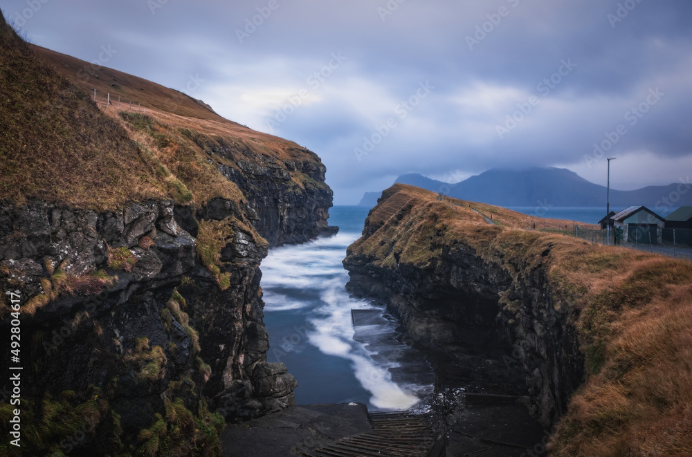 Obraz premium Historical port in Gjogv village, Faroe Islands. November 2021