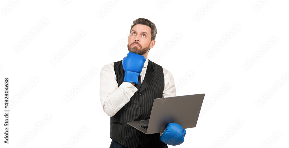 pondering man in boxing gloves and suit hold laptop isolated on white background, ponder pondering man in boxing gloves and suit hold laptop isolated on white background, ponder