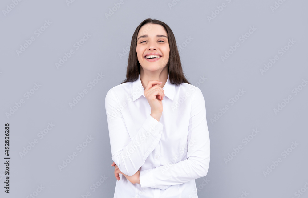happy businesslike woman in white shirt on grey background, business happy businesslike woman in white shirt on grey background, business