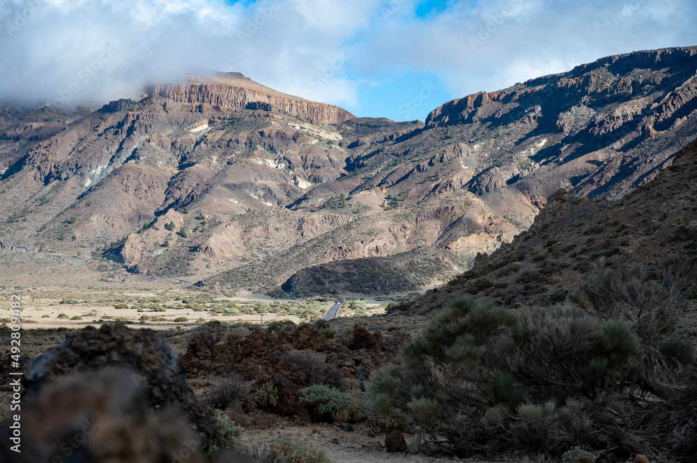 Visiting Teide national park on Tenerife and view on volcanic landscapes, Canary islands, Spain