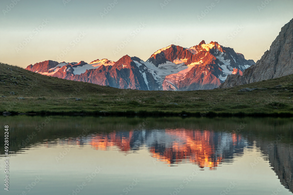 Lever de soleil au lac de la Ponsonnière en été , Massif des Cerces , Alpes , France	