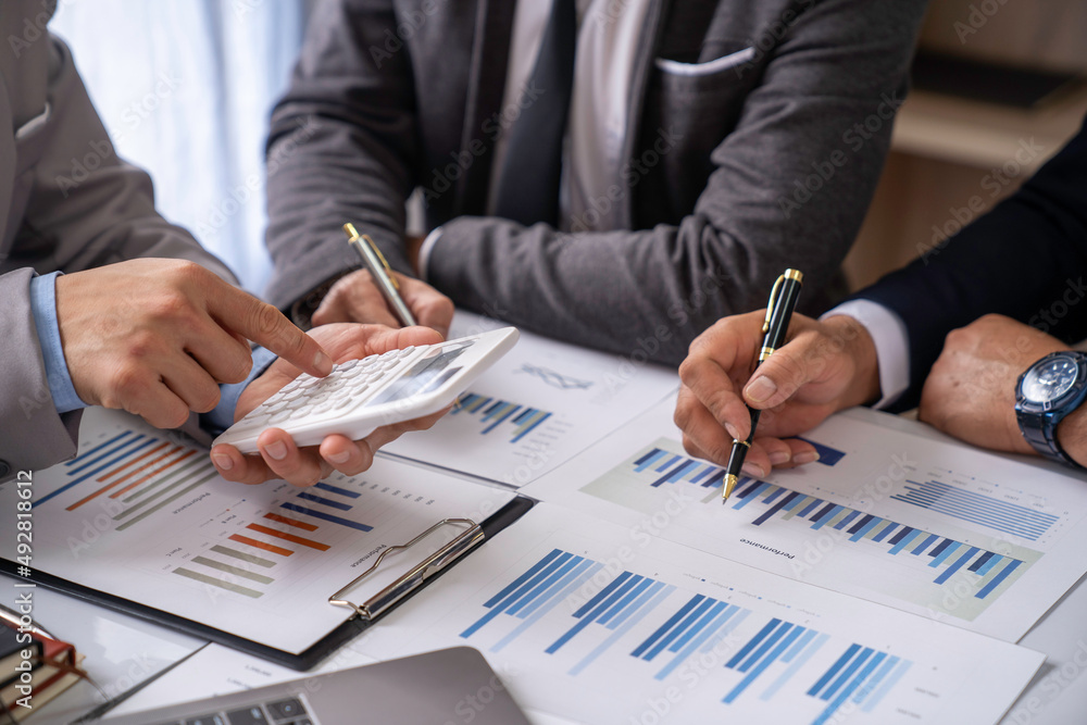 Meeting concept Business team hands at working with financial plan, meeting, discussion, brainstorm with tablet on the office desk Meeting concept Business team hands at working with financial plan, meeting, discussion, brainstorm with tablet on the office desk