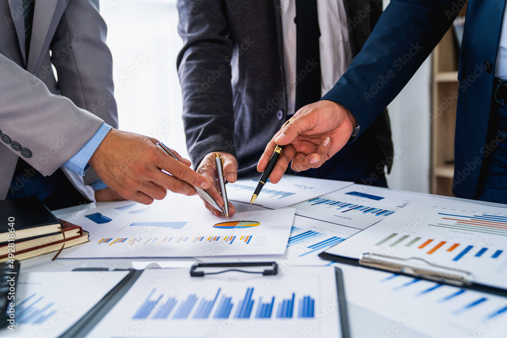 Meeting concept Business team hands at working with financial plan, meeting, discussion, brainstorm with tablet on the office desk Meeting concept Business team hands at working with financial plan, meeting, discussion, brainstorm with tablet on the office desk