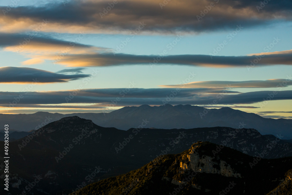 Sunset and wind clouds in La Garrotxa, Girona, Spain