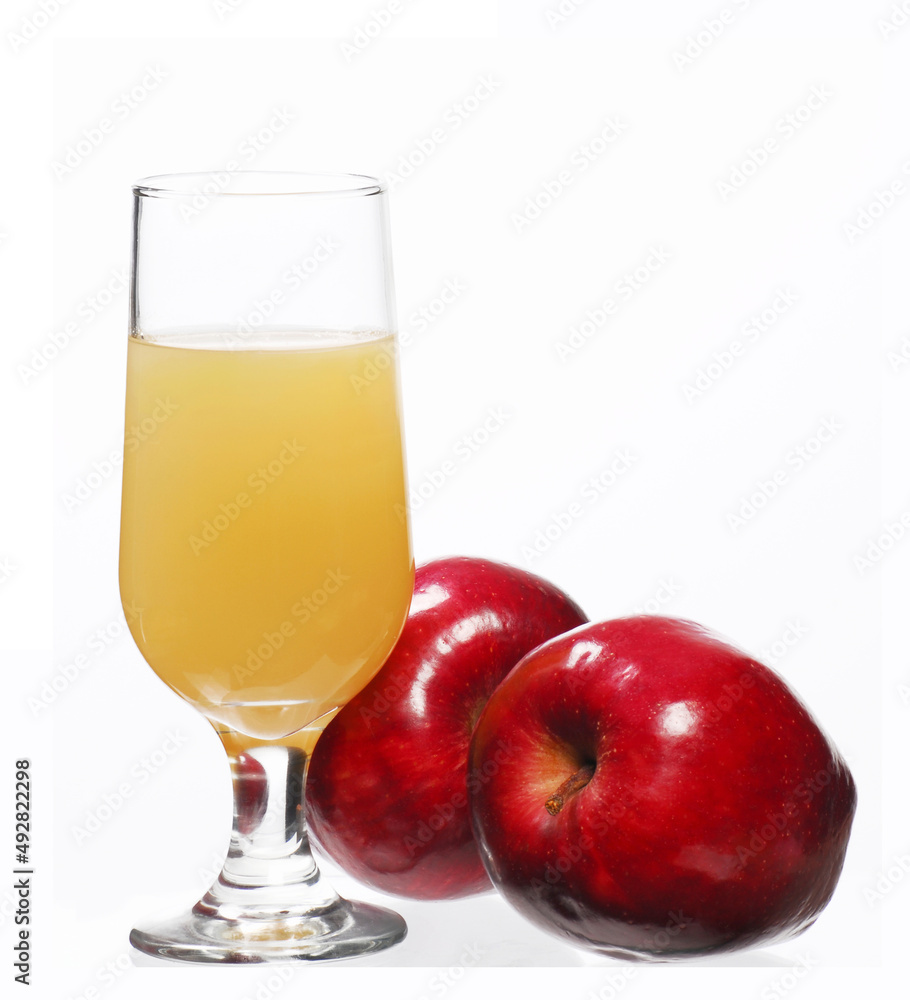 Natural apple juice glass and apple fruits on white background.