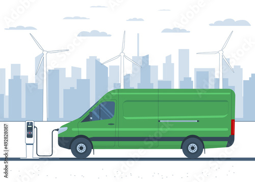 Electric cargo van on the background of an abstract city landscape and wind turbines. Vector illustration.