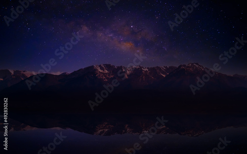 Landscape with Milky Way. Night sky with stars on the mountain