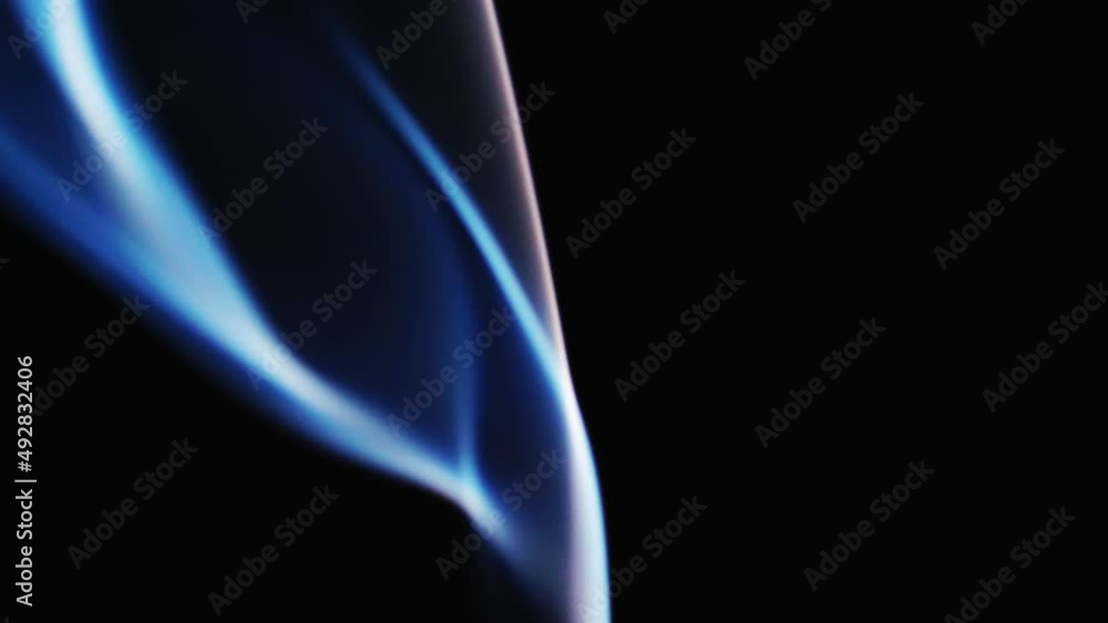 Abstract blue color smoke with a black background in slow motion. Realistic cloud smoke with streamline pattern. Abstract blue color smoke with a black background in slow motion. Realistic cloud smoke with streamline pattern.
