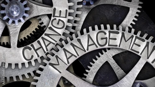 Group of rotating tooth wheels with Change Management sign imprinted on metal surface. High quality 4k video.