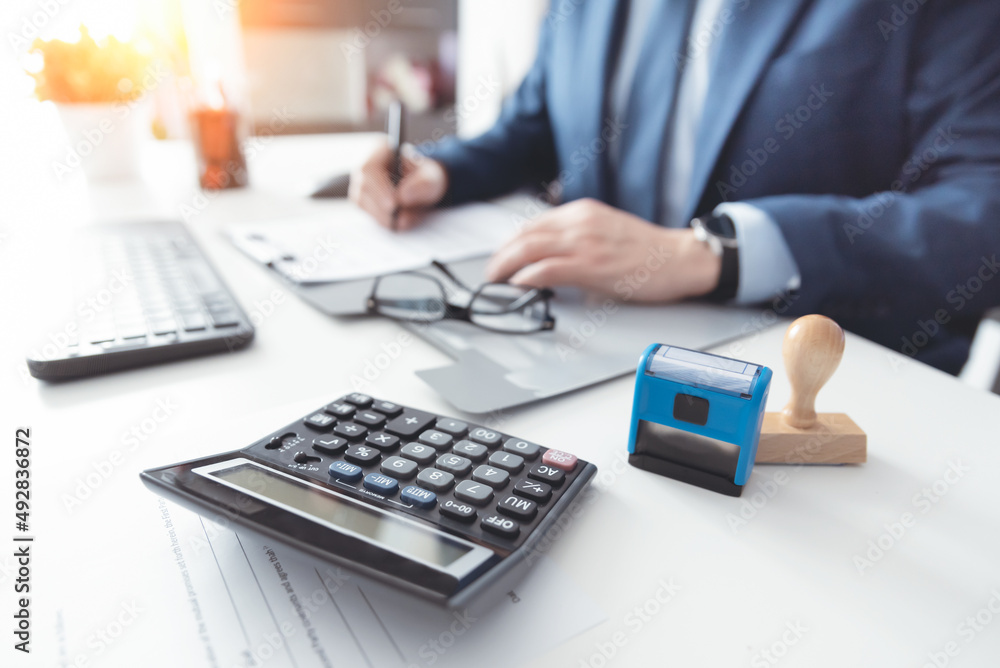 Accountant analyzing finance statement Accountant analyzing finance statement