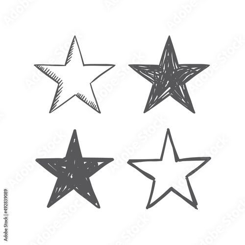 Hand drawn star icons. Set of doodle stars.