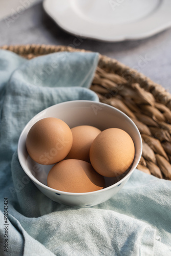 Organic brown eggs in bowl