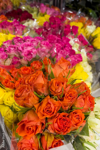 Colorful  Roses in a Flower Shop. Flowers Background 