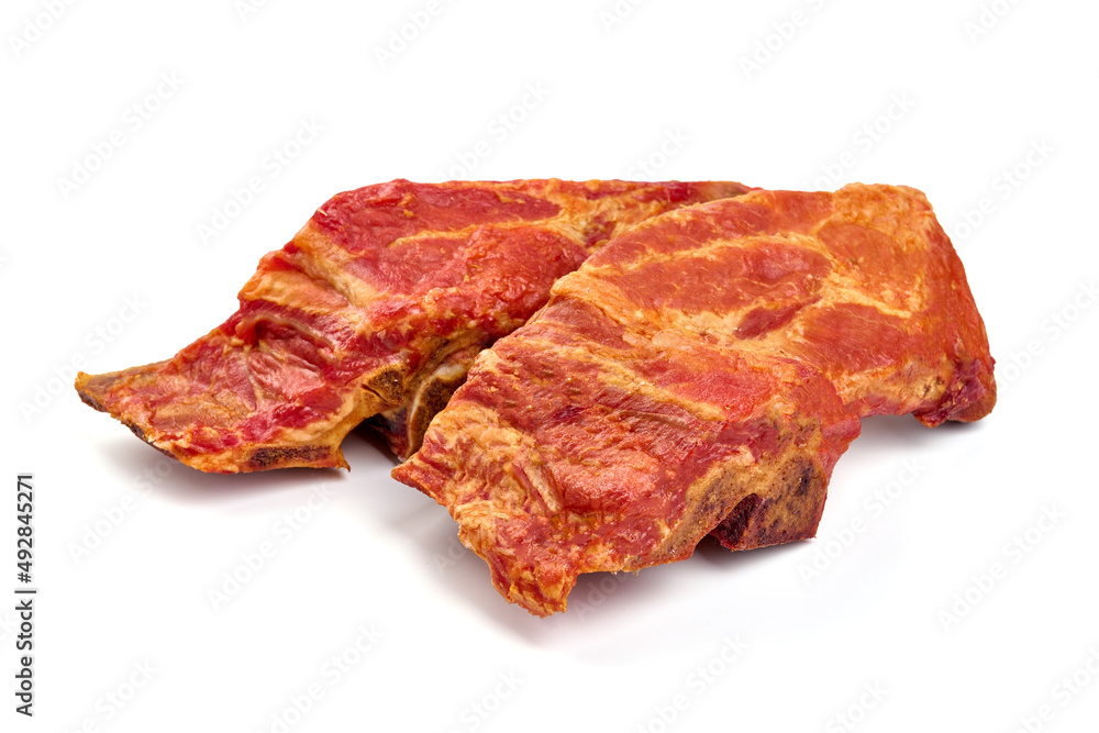 Smoked pork ribs, isolated on white background. High resolution image.