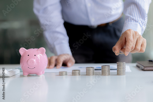 Stacks of coins arranged in a row from low to high, analogous to the growth of money, investing in stocks, stock market chart graphics showing stock trading. The idea of investing money.