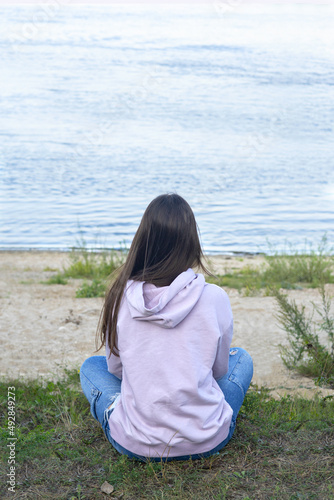 recreation river bank girl meditation