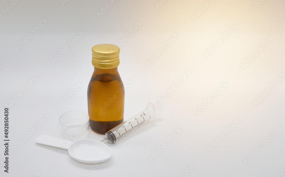 medicial child liquid bottle drug for kid illness isolate on white with sun medicial child liquid bottle drug for kid illness isolate on white with sun