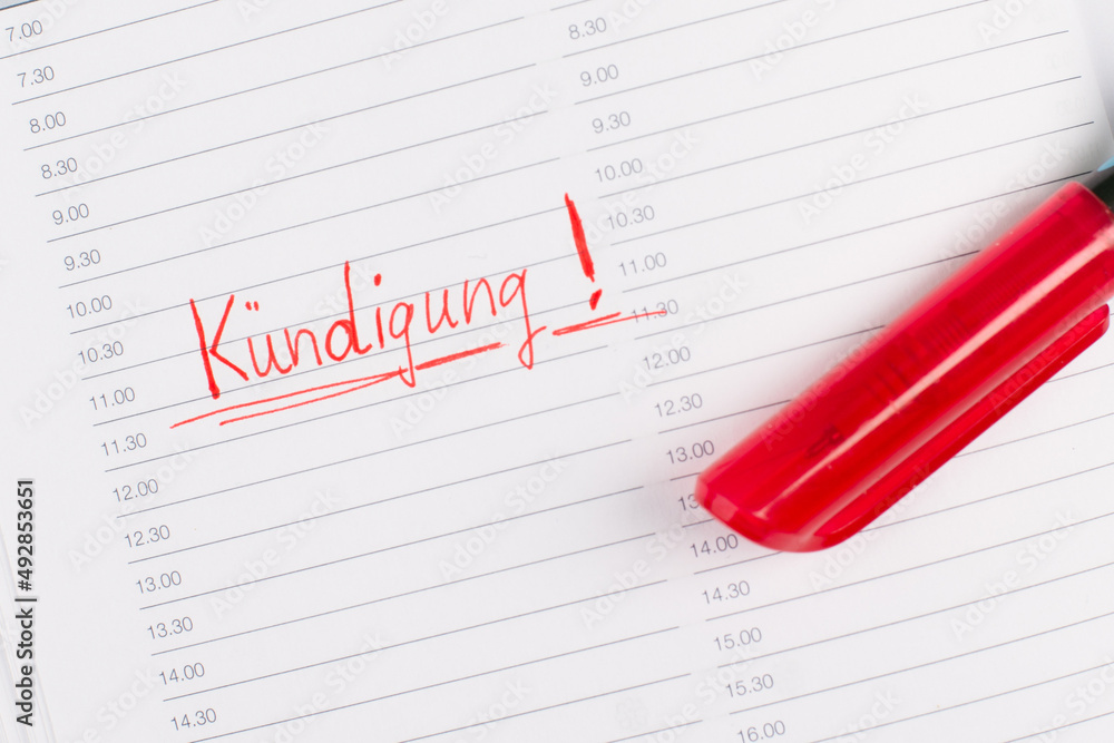 Termination is standing in german language in a calendar, red color and pen, fired from job, unemployeed Termination is standing in german language in a calendar, red color and pen, fired from job, unemployeed