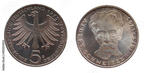  5 Deutsche Mark coin of the Federal Republic of Germany with the cote of arm eagle and a portrait of the doctor, philosopher, evangelical theologian and organist Albert Schweitzer photo