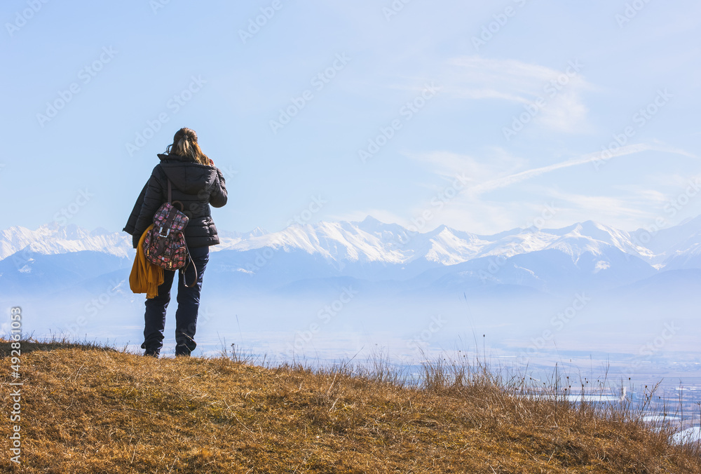 woman walking in the mountains