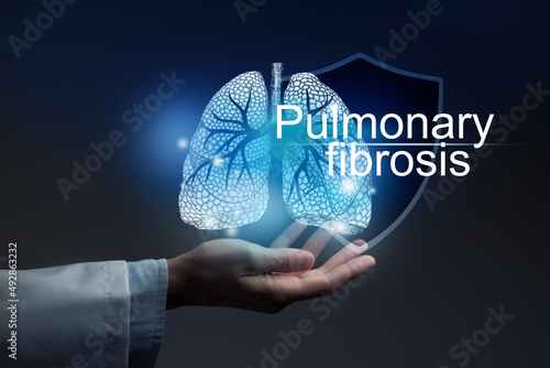 Medical banner Pulmonary fibrosis on blue background photo