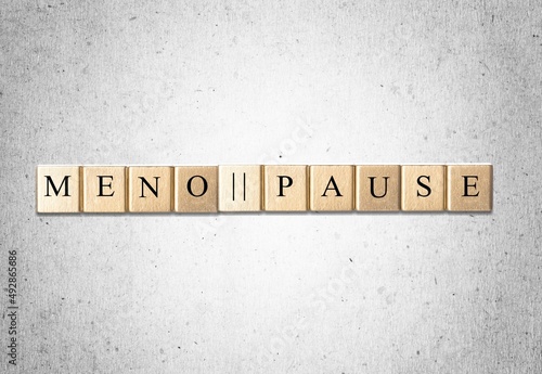 Menopause word and pause sign on wooden blocks cubes © BillionPhotos.com