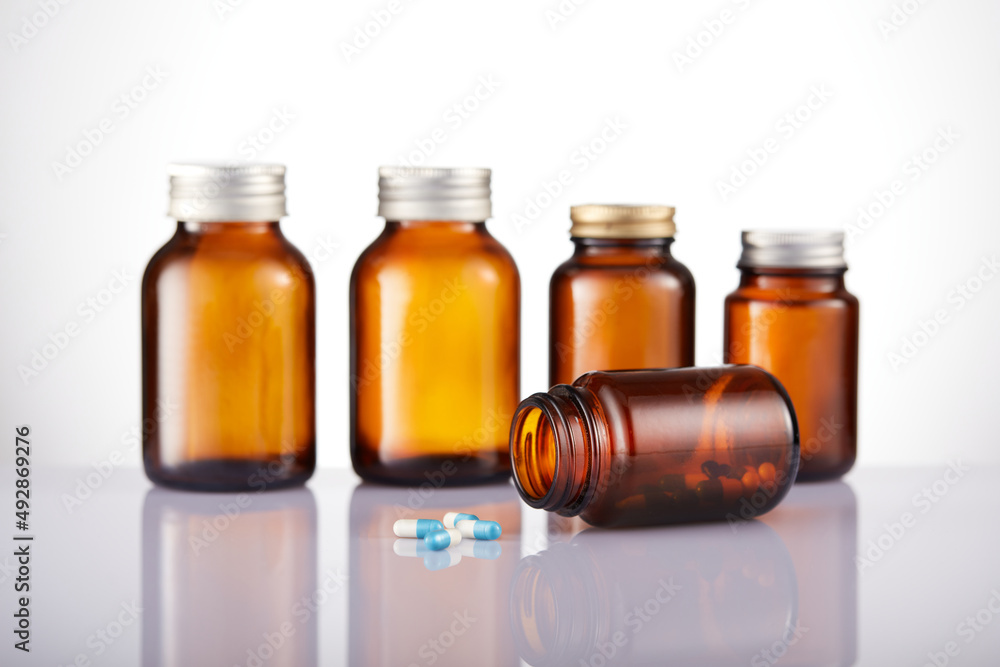 Set of empty brown glass medicine bottles. Amber bottle samples. Set of empty brown glass medicine bottles. Amber bottle samples.
