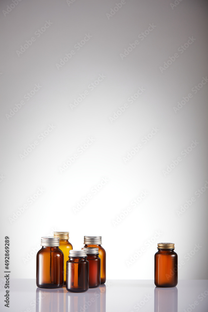 Set of empty brown glass medicine bottles. Amber bottle samples. Set of empty brown glass medicine bottles. Amber bottle samples.