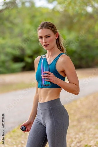 Lovely Blonde Model Enjoying A Summers Day While Preparing To Workout