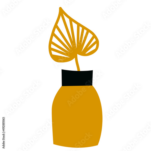 golden vase with decorative plant monstera for interior