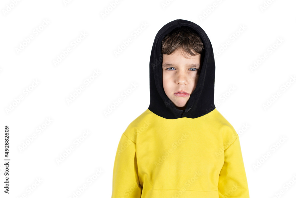 On a white background portrait of a little boy 6 years old, the boy is very hurt and he is sad, the concept of health in children, the preservation of children's rights, anti-violence On a white background portrait of a little boy 6 years old, the boy is very hurt and he is sad, the concept of health in children, the preservation of children's rights, anti-violence