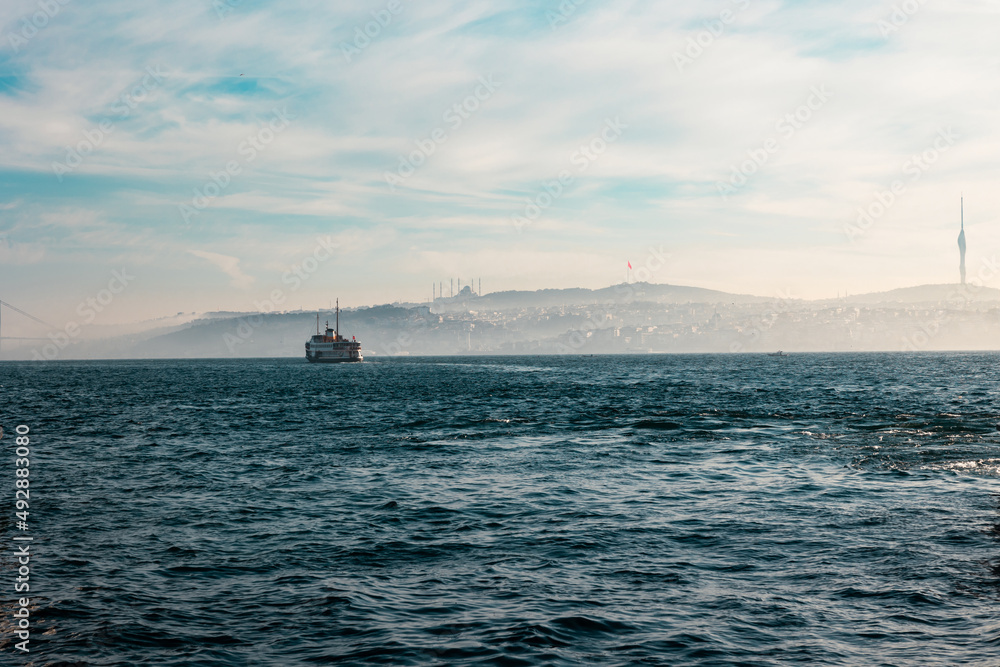 Istanbul view. A foggy morning in bosphorus in Istanbul and a ferry. Istanbul view. A foggy morning in bosphorus in Istanbul and a ferry.