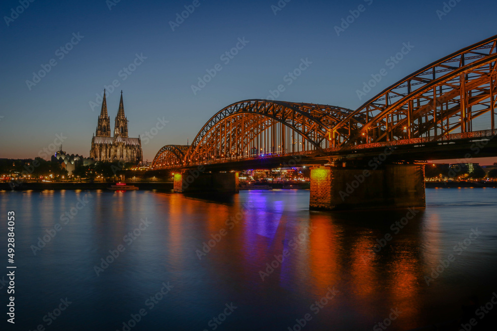 Fototapeta premium The Hohenzollern Bridge and Cologne Cathedral in the city of Cologne, Germany