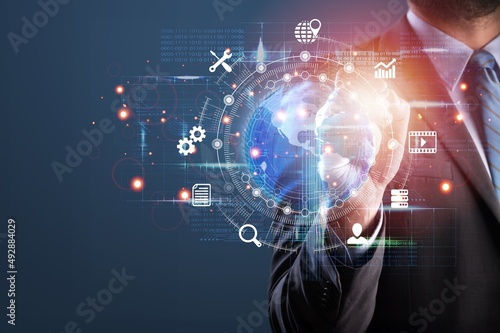 Business man showing the future world. Global Internet connection application technology.