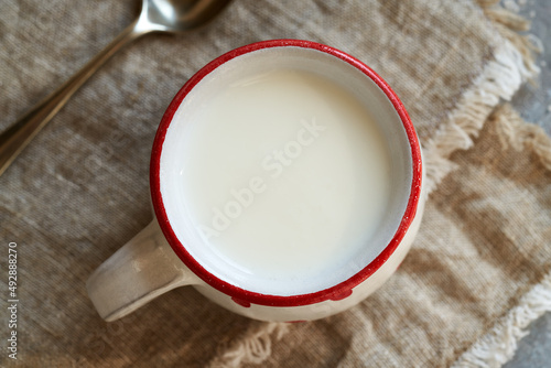 Probiotic kefir in a white and red cup