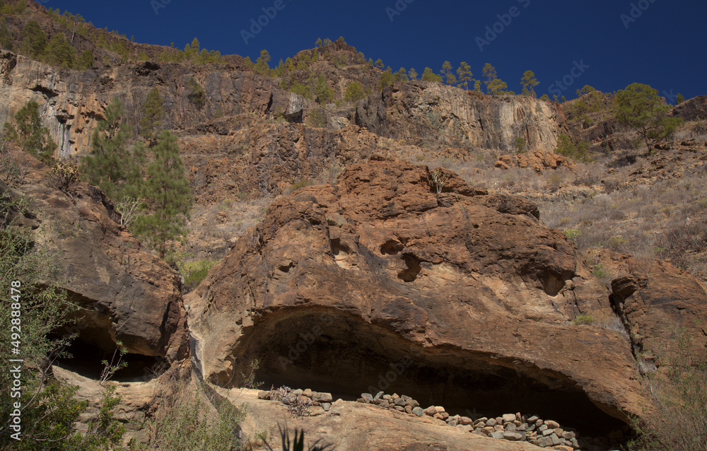 Gran Canaria, landscape of the southern part of the island along Barranco de Arguineguín steep and deep ravine
with vertical rock walls, circular hiking route starting at a hamlet Barranquillo Andres
