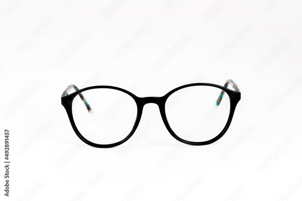 optical glasses frame stands on a white background optical glasses frame stands on a white background