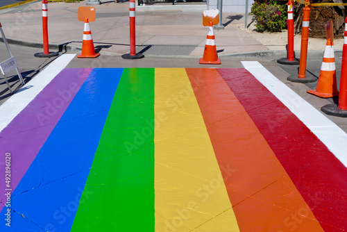 rainbow colored pedestrian crosswalk in support of LGBTQ