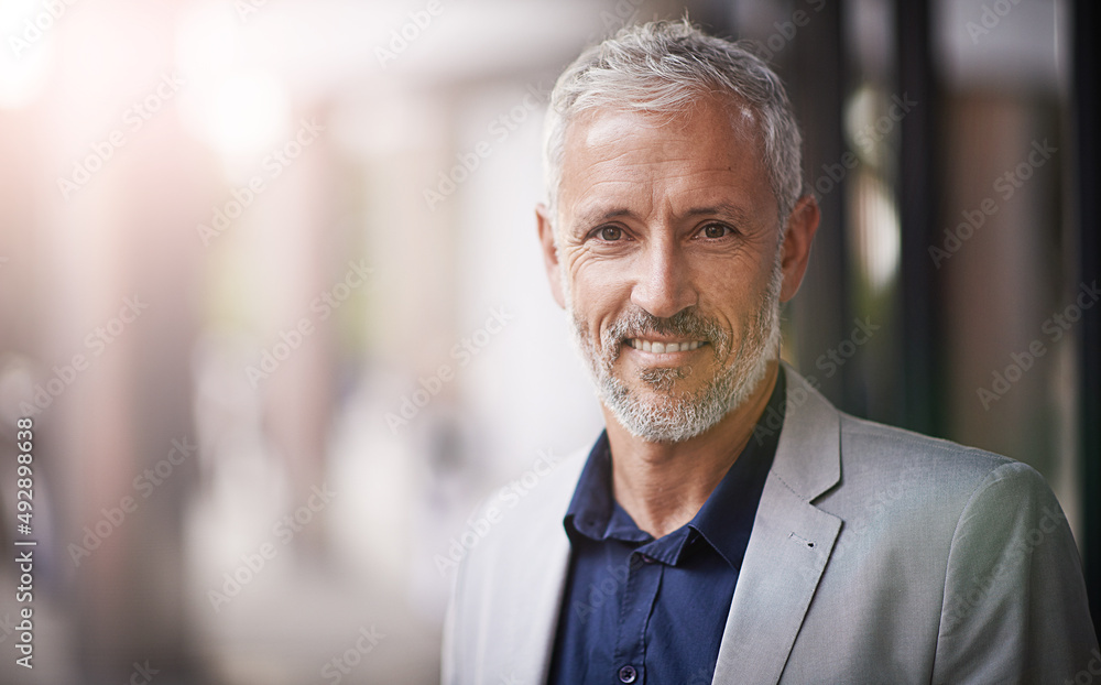 Im confident in my abilities. Portrait of a mature businessman standing outside. Im confident in my abilities. Portrait of a mature businessman standing outside.