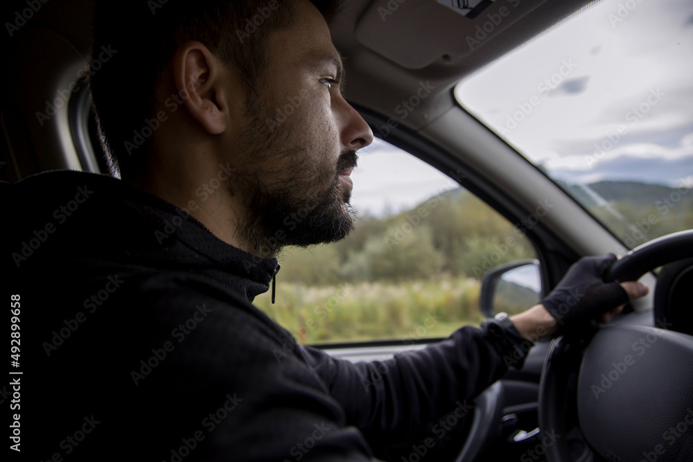 Man driving a car Man driving a car